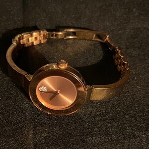Minimalist Movada brand Rose Gold Bangle Watch with Crystal Accent